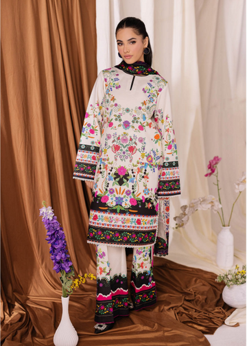 Woman wearing a colorful embroidered traditional outfit with a brown curtain background