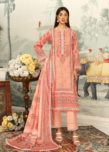 Woman wearing a peach embroidered outfit in a decorated room with flowers and artwork.