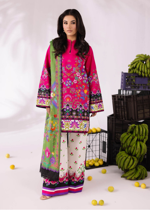 Woman wearing a colorful traditional outfit with a white background and bananas on the floor.