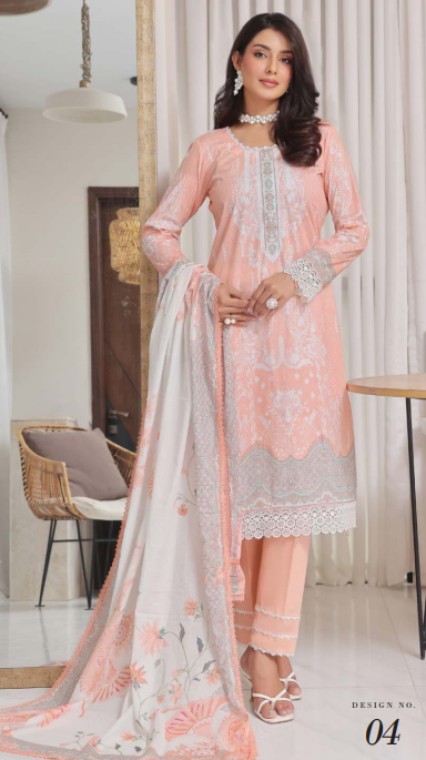 Woman wearing a peach-colored embroidered outfit with a white dupatta in a modern interior setting.