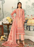 Woman wearing a peach embroidered outfit in a decorated room with flowers and artwork.