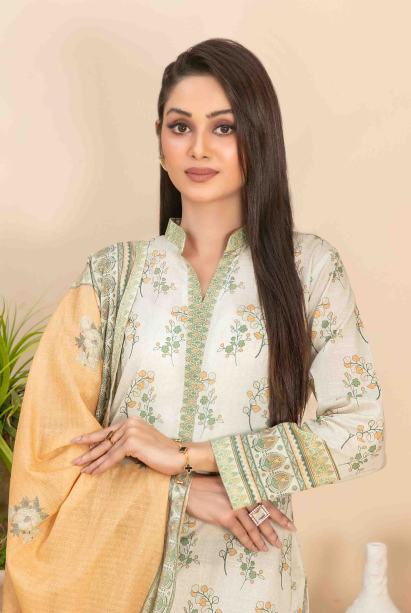 Woman wearing a traditional outfit with a beige and green patterned design.
