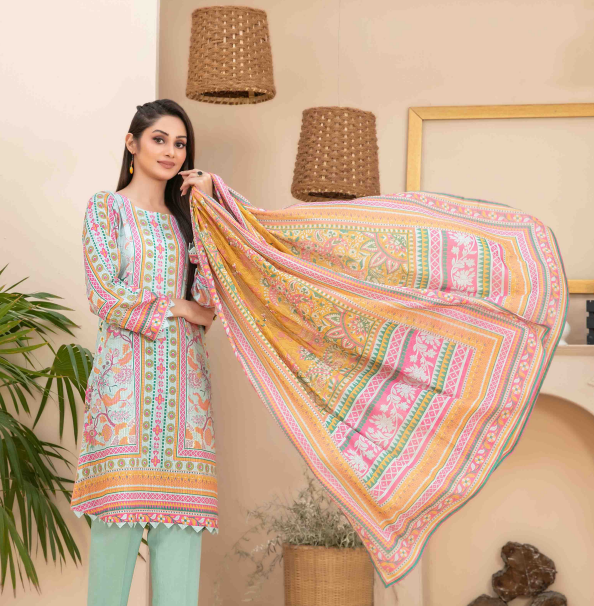 Woman holding a colorful patterned scarf in a home setting