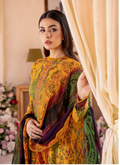 Woman wearing a colorful traditional outfit with intricate patterns, holding a curtain.