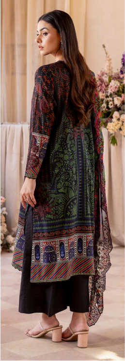 Woman wearing a patterned dress with a floral arrangement in the background